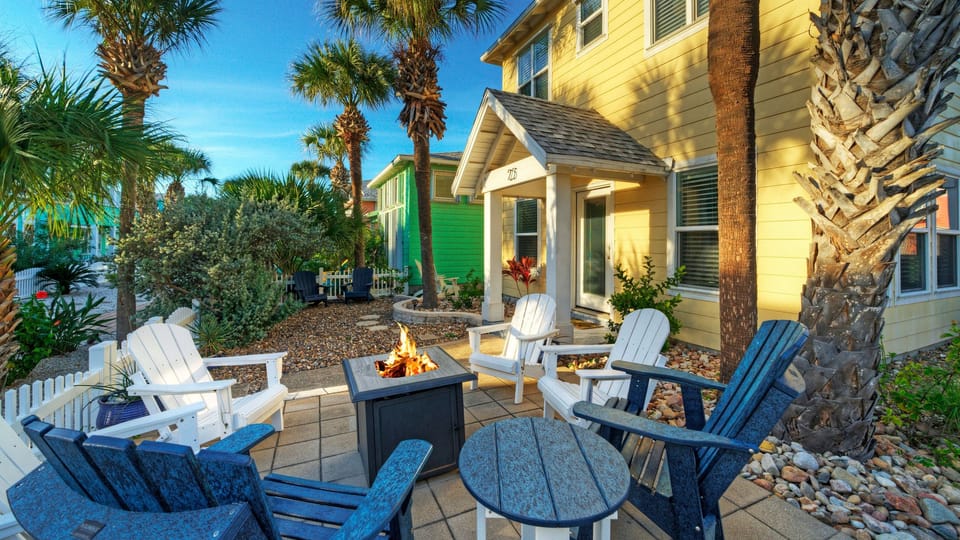 Private outdoor seating centered around a fire pit—perfect for evening conversations, coastal breezes, and laid-back nights under the palms.