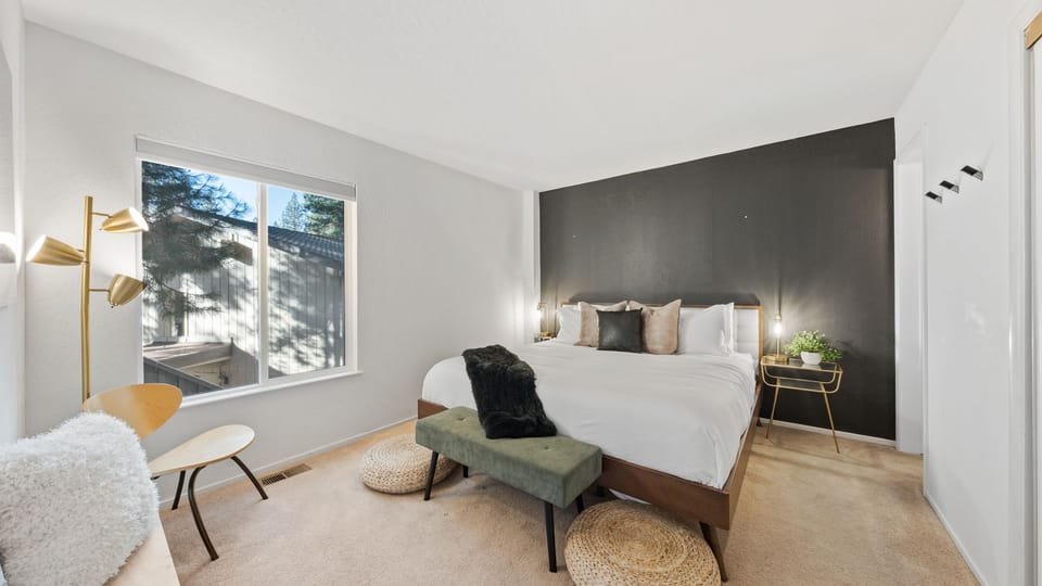 The primary bedroom features a king bed and an ensuite bathroom.