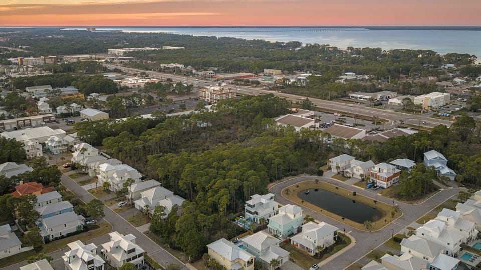 Aerial view of a quiet coastal neighborhood just minutes from the beach, with easy access to Destin’s shoreline, dining, and attractions.