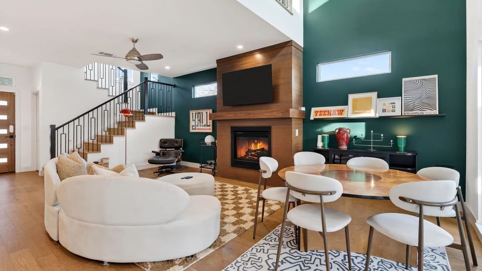 Sleek, modern kitchen with a spacious island, stainless steel appliances, and bar seating for casual meals.