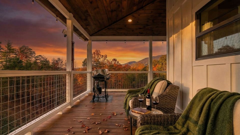 Cozy up with a glass of wine or fire up the grill beneath the warm glow of the covered balcony.