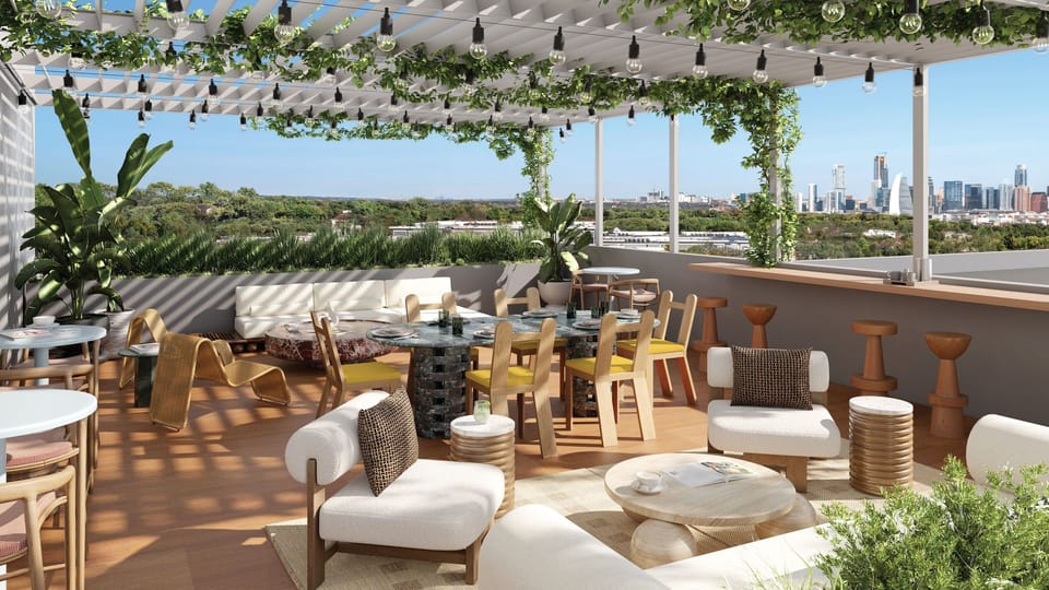 Shared rooftop terrace with skyline views.