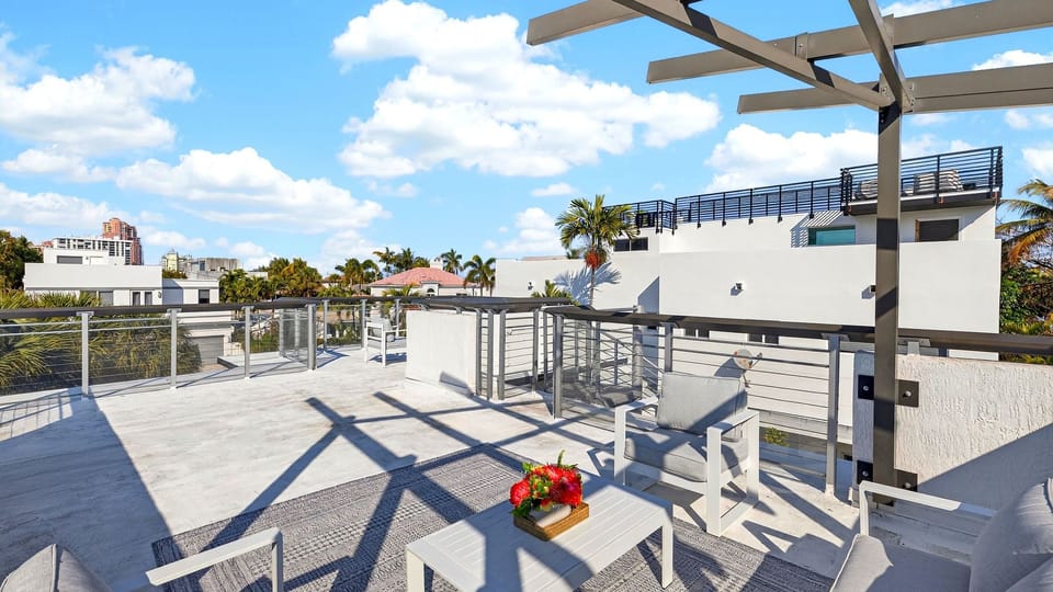 Rooftop lounge goals—soak up the sun with breezy skyline views and plenty of space to unwind.
