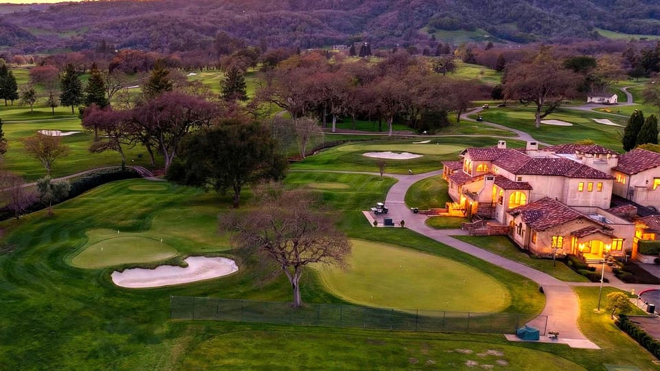 Golden hour across Sonoma’s rolling fairways and vineyard hills — scenic golf views just moments from the property.