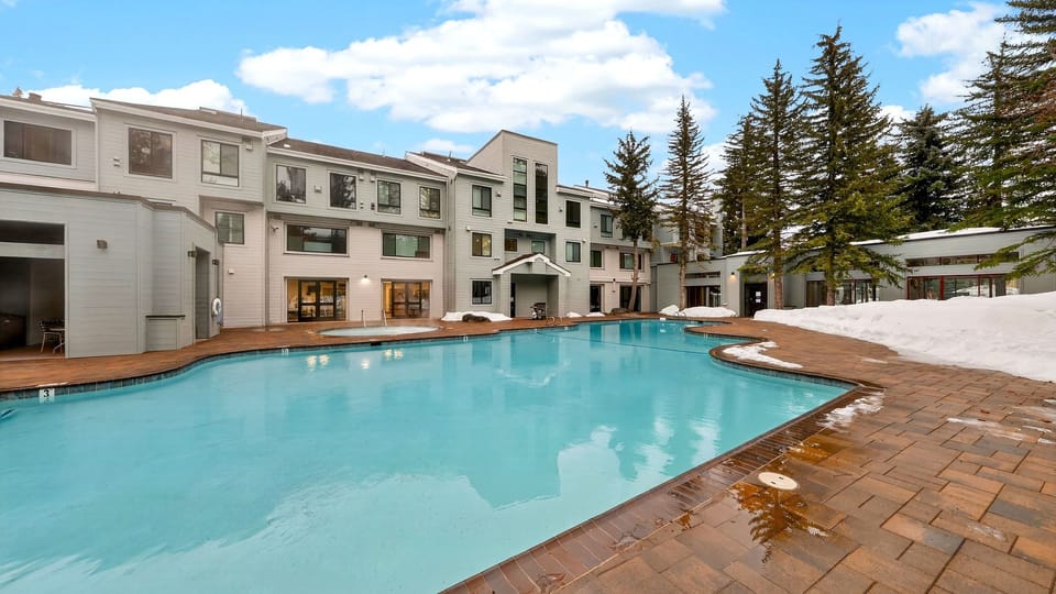 Enjoy year-round swimming in the community pool, surrounded by towering pines and fresh mountain air.