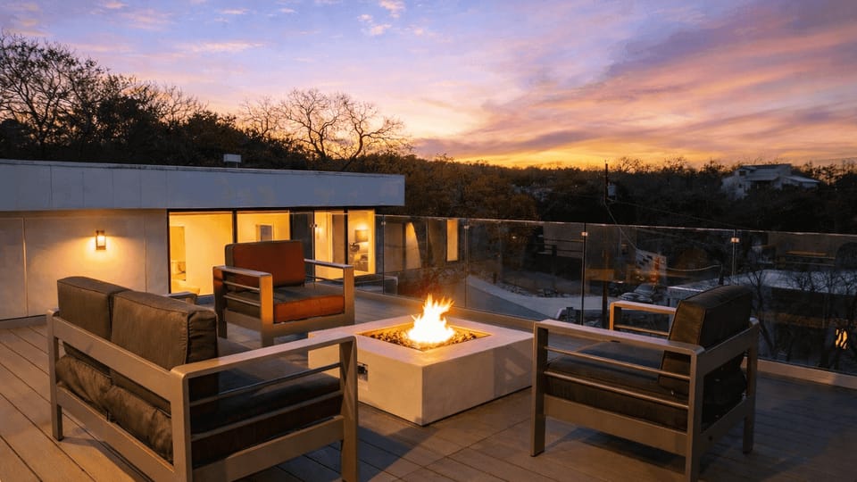 Sunset deck vibes—gather by the fire table and watch the sky light up.