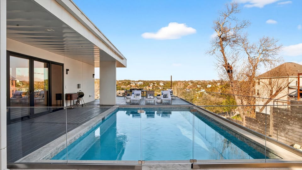 Infinity-edge pool with sweeping Hill Country views—your Austin escape starts here.