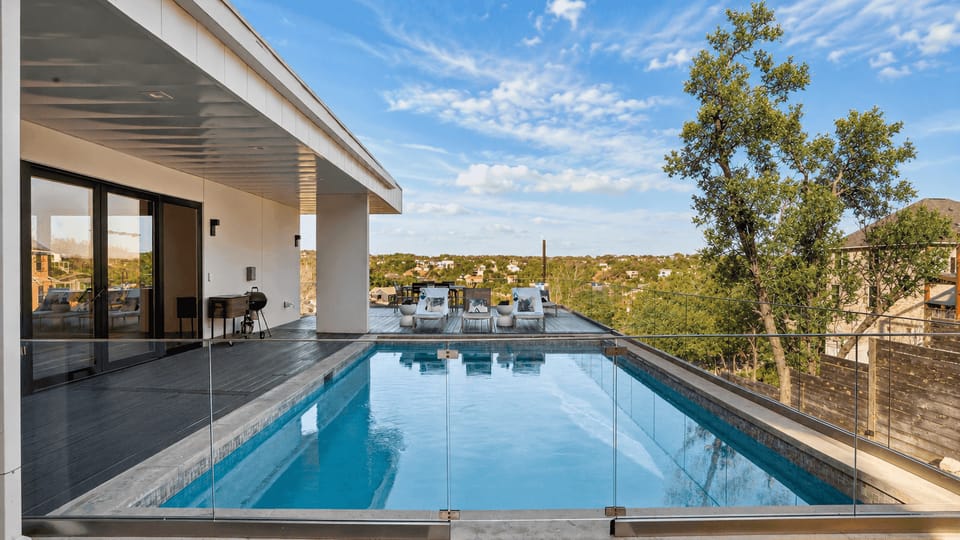 Infinity-edge pool with sweeping Hill Country views—your Austin escape starts here.