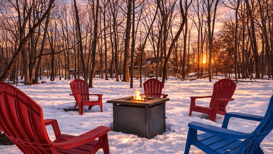 Outdoor fire pit with classic Adirondack seating.