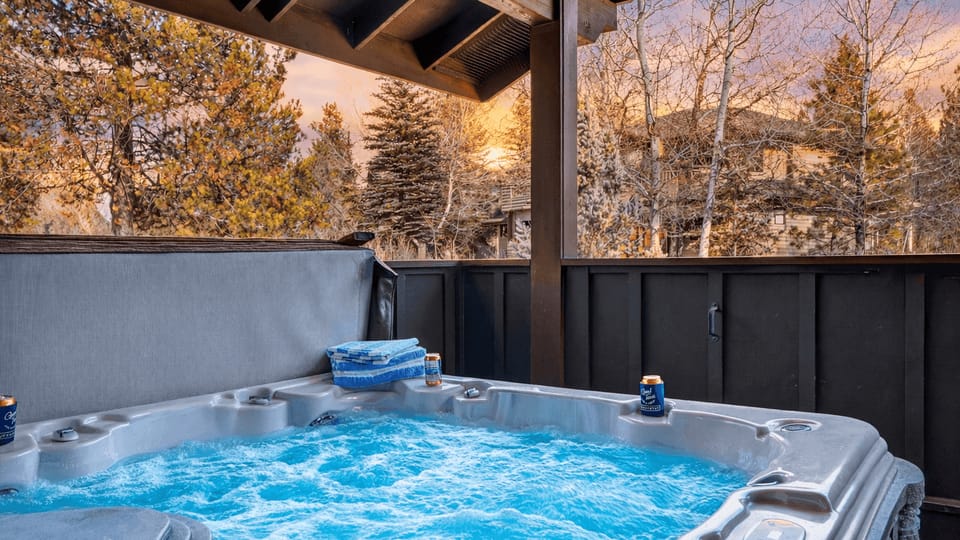 Unwind year-round in your private covered hot tub—bubbly bliss with fresh mountain air and treetop views.