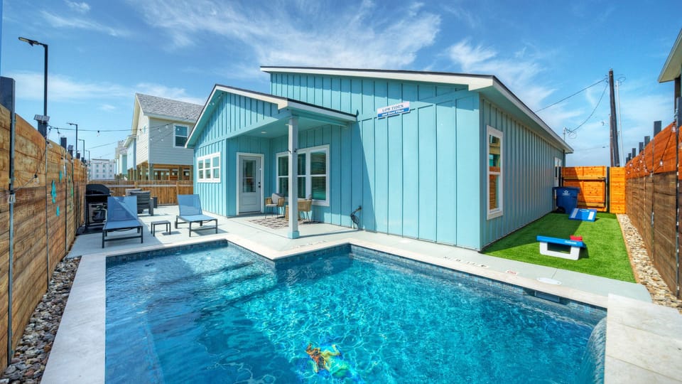 Your private pool is perfect for sunny Port Aransas days, with lounge seating and space to unwind right outside the house.