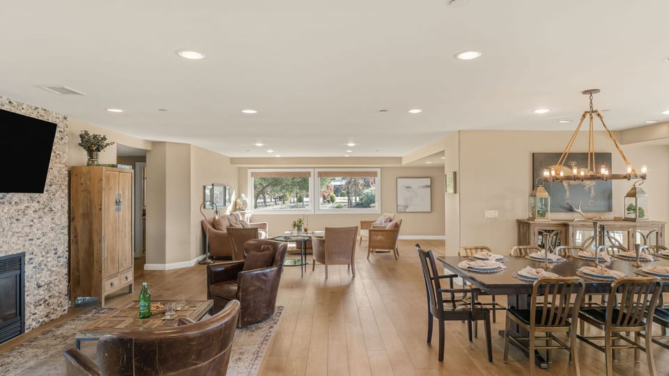 Wide view showing the seamless flow between the living and dining areas, Main house.