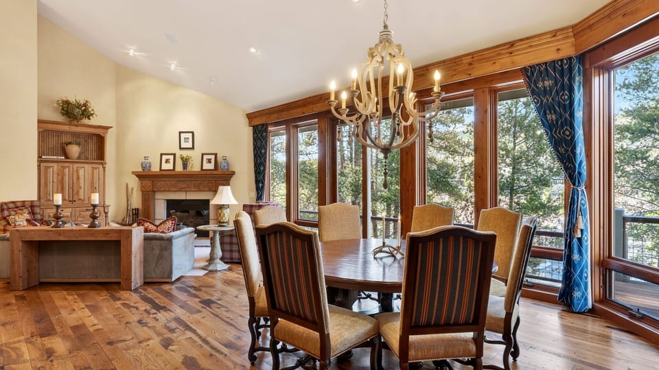 A chef’s kitchen with custom cabinetry, premium appliances, and a large island for easy gathering.