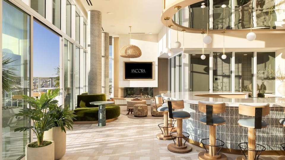 Our double-height lobby and lounge areas showcase the unique flair of Little Italy.