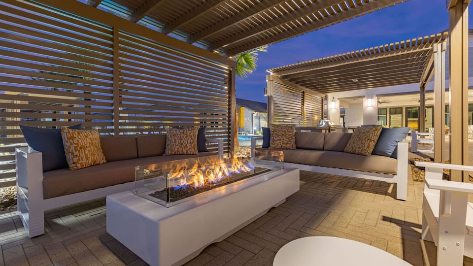 Cozy up by the outdoor fire pit and enjoy the stunning desert sunset.