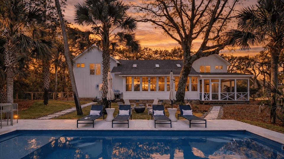Private pool, lounge seating, and a peaceful backyard made for laid-back Lowcountry days.