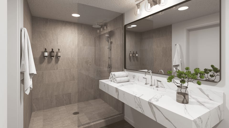 The full bathroom features a walk-in shower.