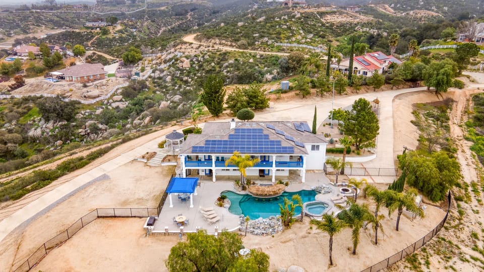 Expansive hillside retreat with a private pool, spa, and stunning views in every direction.