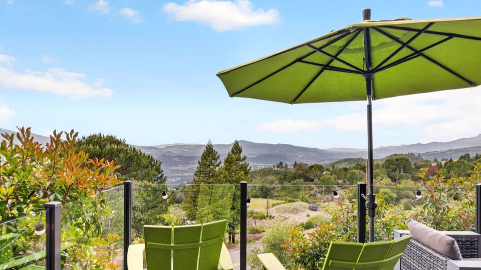 Vibrant Adirondack chairs positioned for the best view.