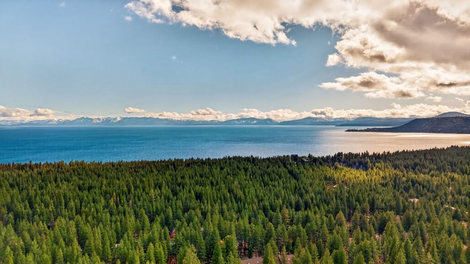 Stunning aerial views of Lake Tahoe and the surrounding pine forest just minutes away.