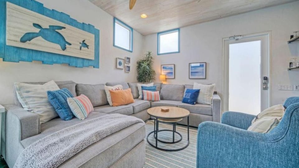 Stylish living area with beachy decor.