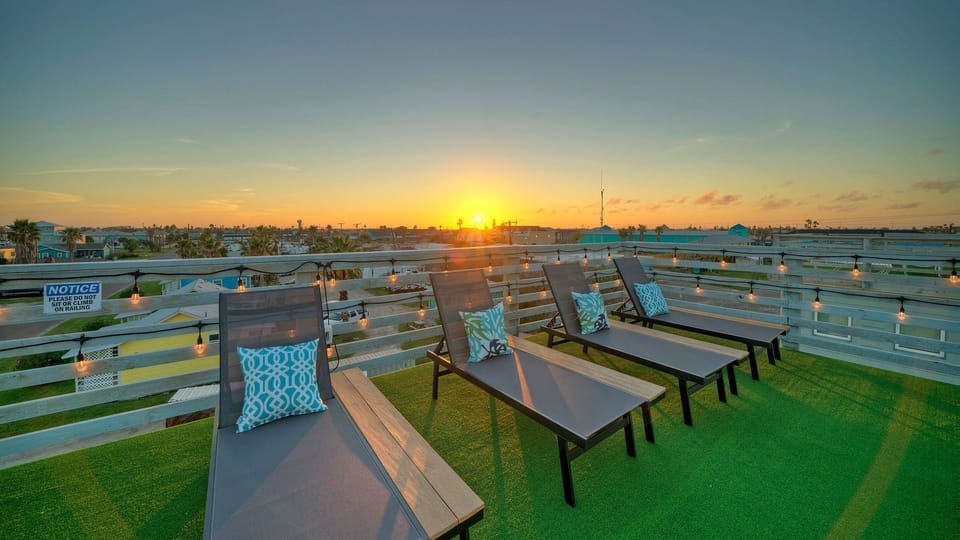 Watch stunning sunsets from your private rooftop deck.