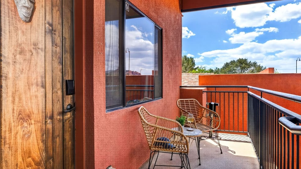 Sip your morning coffee on the shared outdoor hallway while taking in stunning Sedona red rock views.