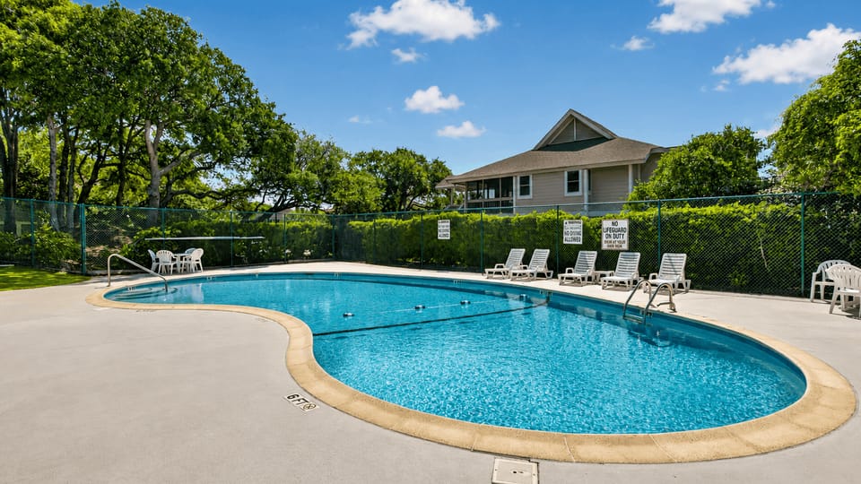 Spend sunny afternoons at the community pool, perfect for cooling off after a day at the beach.