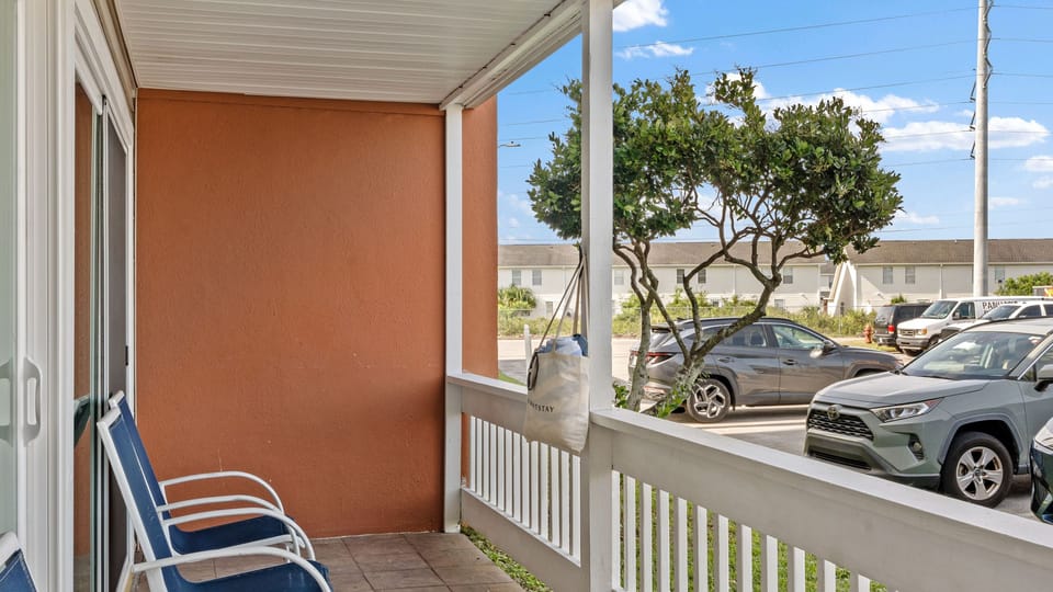 Relaxing private balcony offering a shaded spot to enjoy morning coffee or a cool evening breeze.