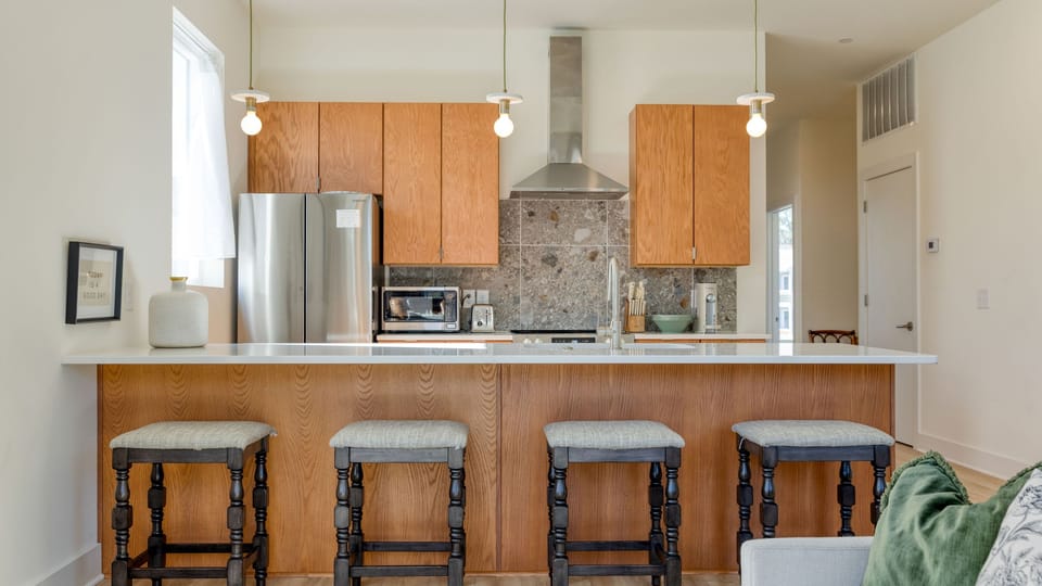 Enjoy casual dining at the kitchen counter with barstool seating. (Hearth &amp; Hideout)