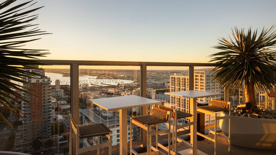 Sip your morning coffee or evening cocktail overlooking the vibrant city and bay.