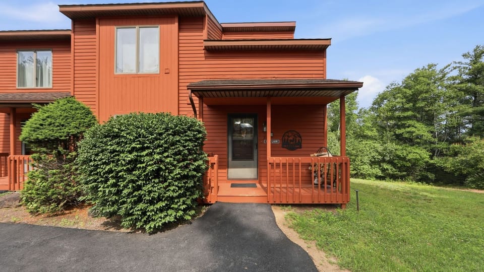 Exterior front entrance and porch of the townhouse unit.