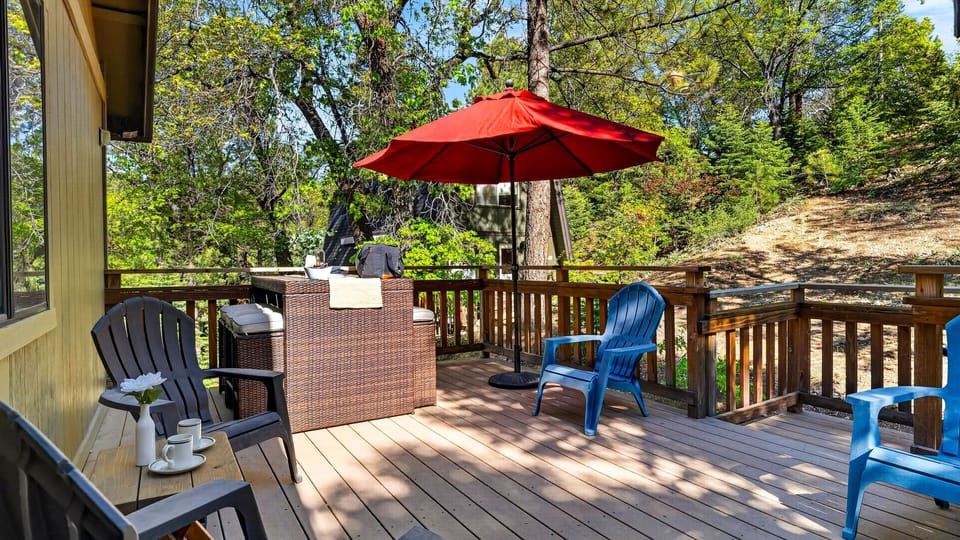 Expansive multi-level decking offers numerous spaces for outdoor entertaining, sunbathing, and relaxing.