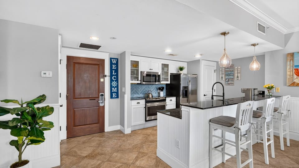 Sleek, modern chef's kitchen.