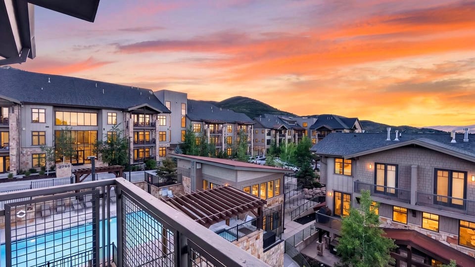 Beautiful sunset sky overlooking the mountain resort community from the private deck.