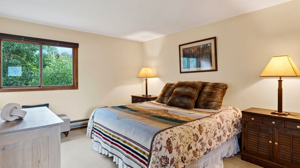 Primary bedroom features a king bed.
