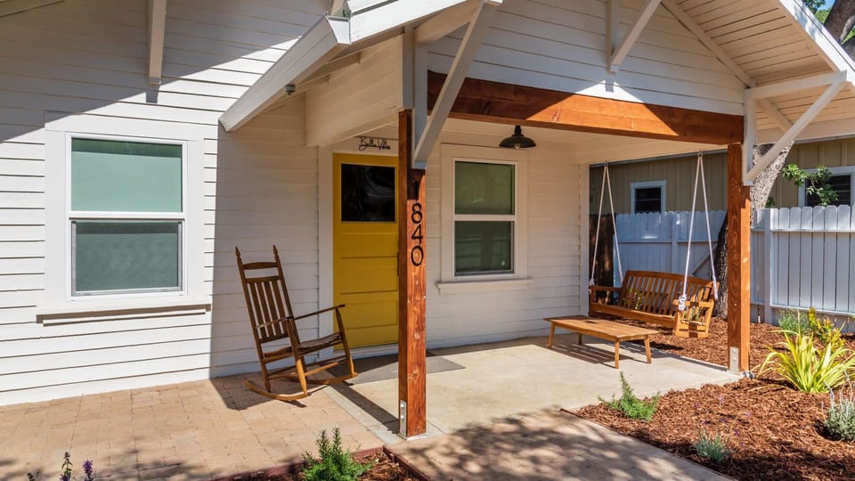 Porch swing and rocking chair set a relaxed arrival