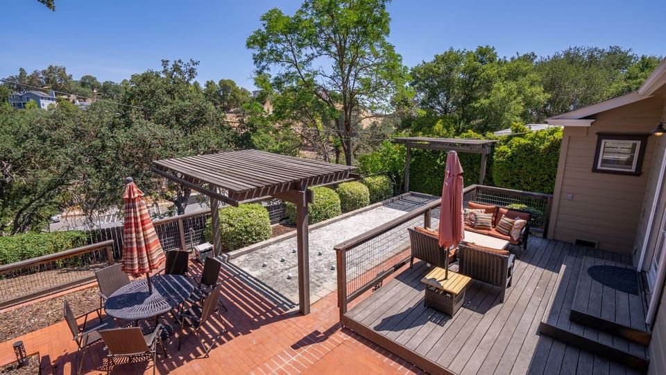 Gather on the deck with shaded lounge and dining space