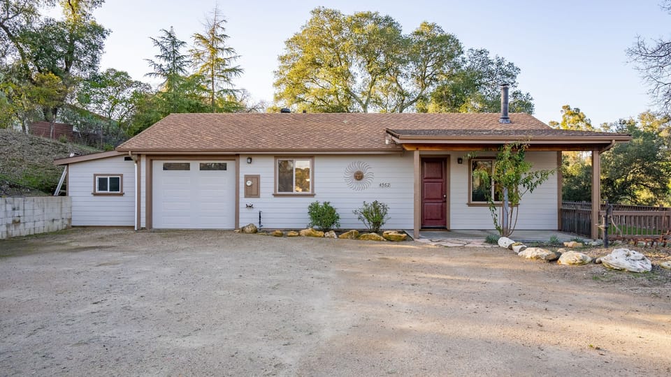 Covered entry and garage bring easy arrival