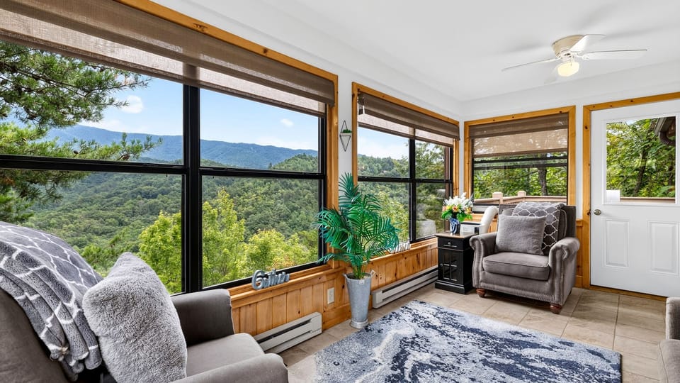 The sunroom couch opens into a queen bed for the extra couple of guests.