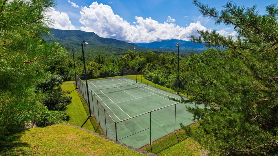 Serve up a match on the mountain-view tennis court, surrounded by trees and sweeping Smoky Mountain scenery.