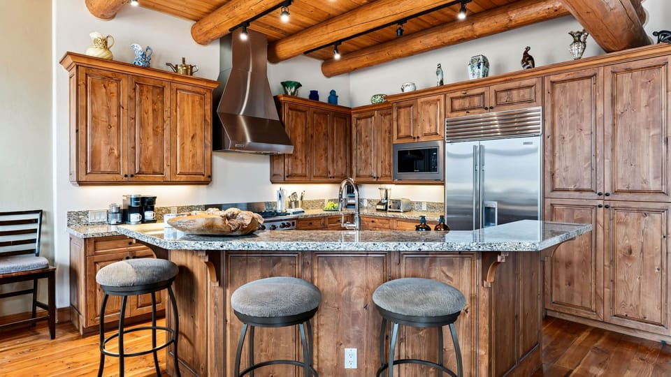 A warm, well-appointed kitchen makes shared meals feel effortless.