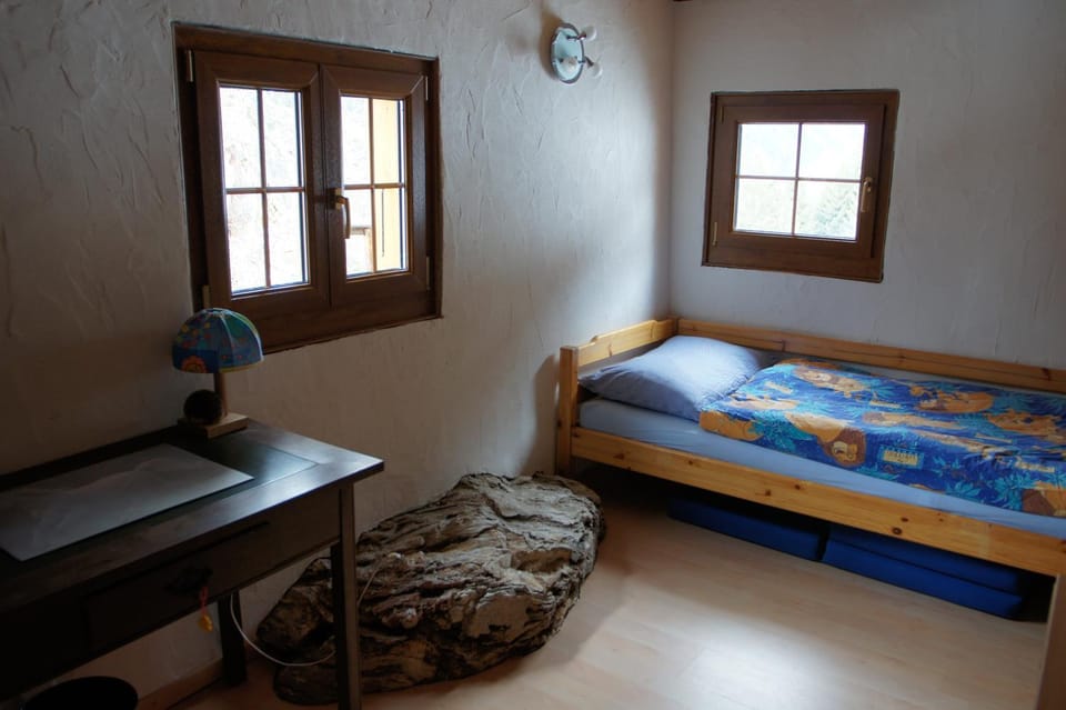 Bed, Seating area, Bedroom
