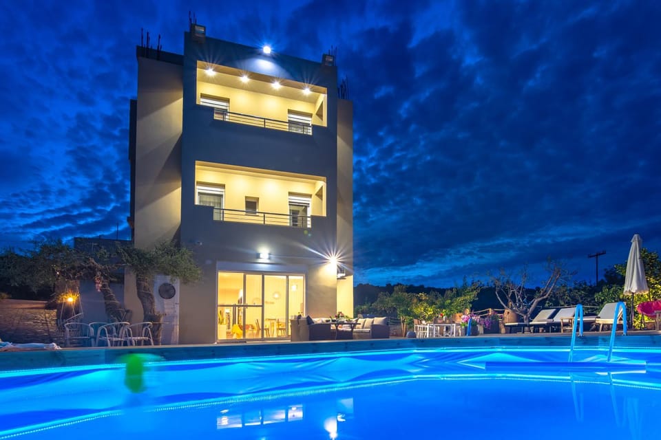 Property building, Night, Pool view, Swimming pool, sunbed
