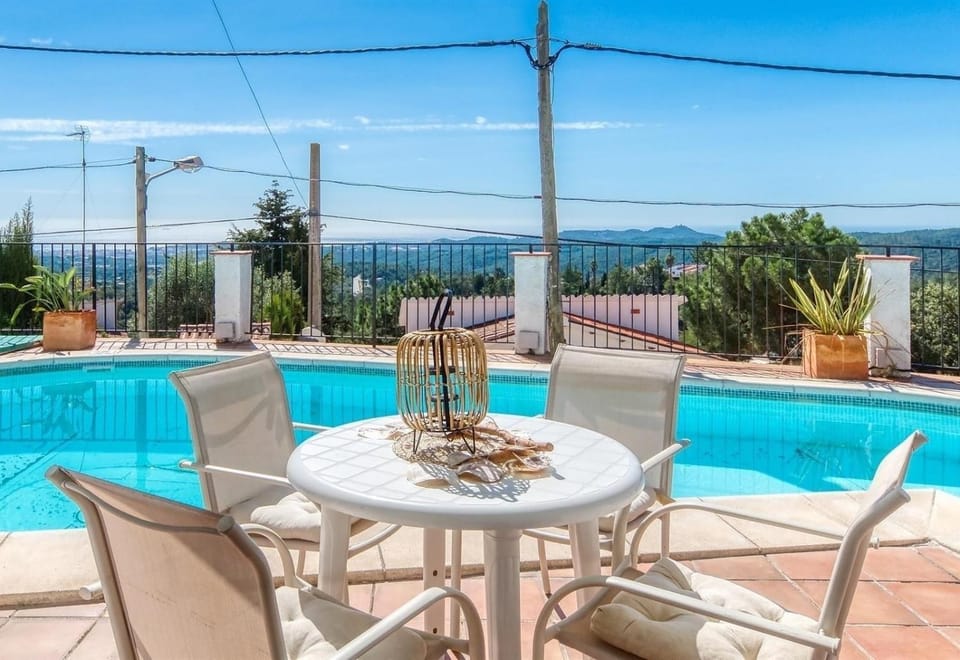 Property building, Living room, Swimming pool