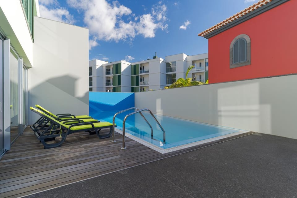 Property building, Patio, Pool view, sunbed