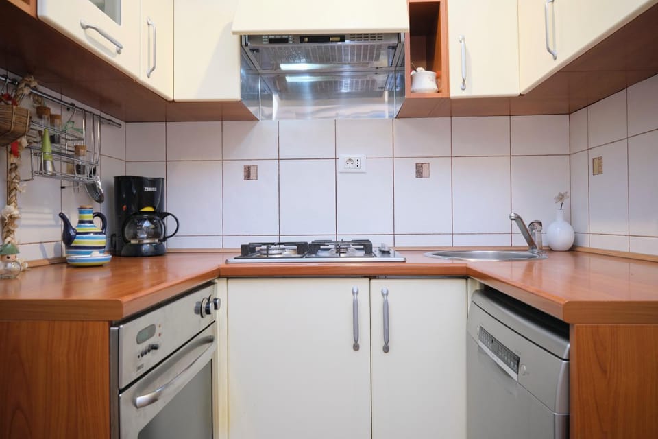 Kitchen or kitchenette, stove