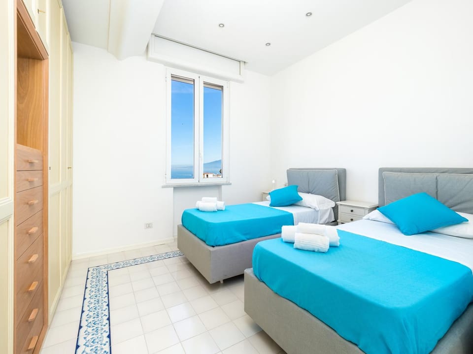 Bed, Photo of the whole room, Bedroom, towels, air conditioner
