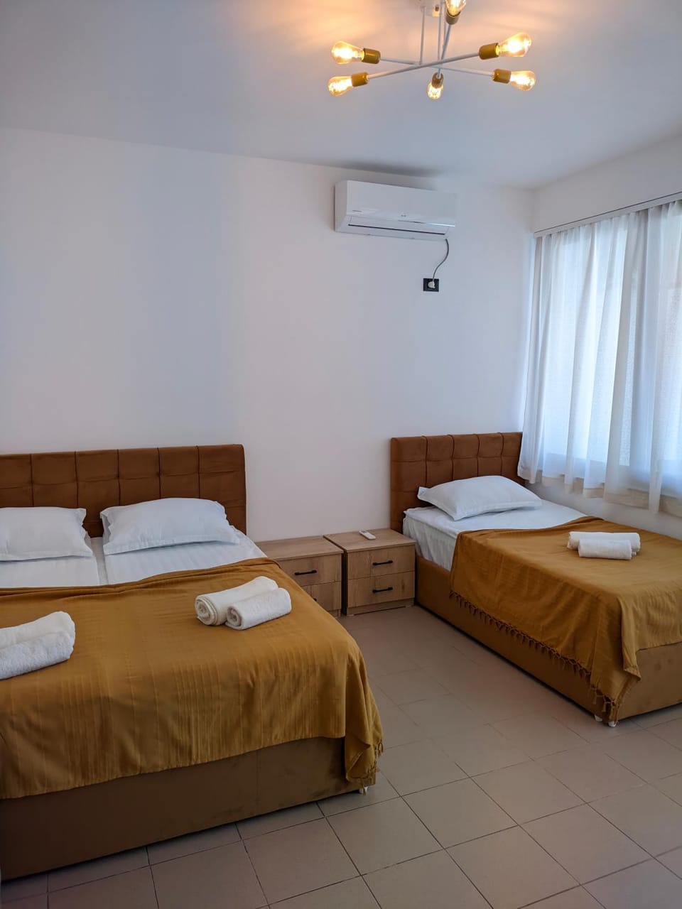 Bed, Photo of the whole room, Bedroom, towels, air conditioner
