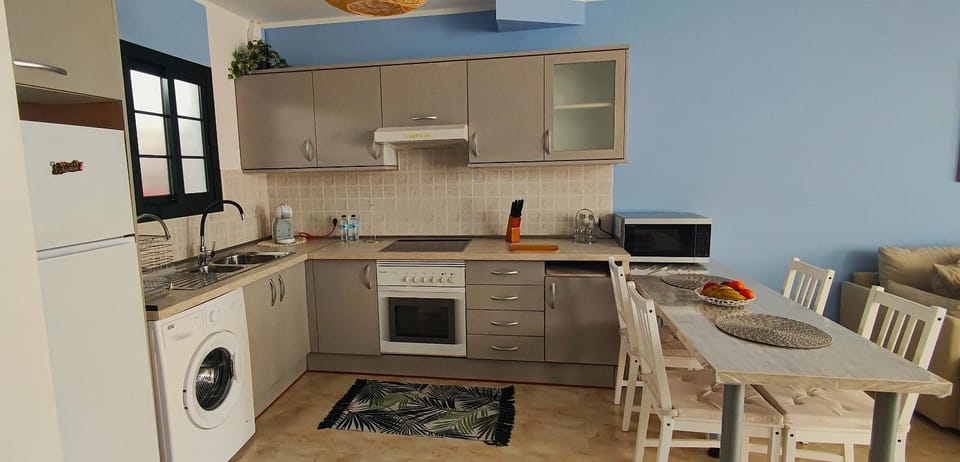 Dining area, stove, washing machine